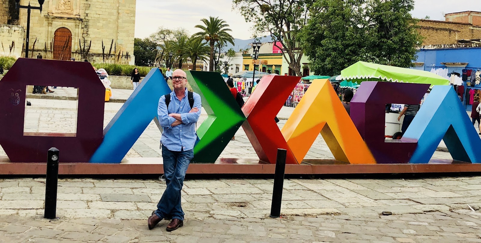 at the colorful Oaxaca sign