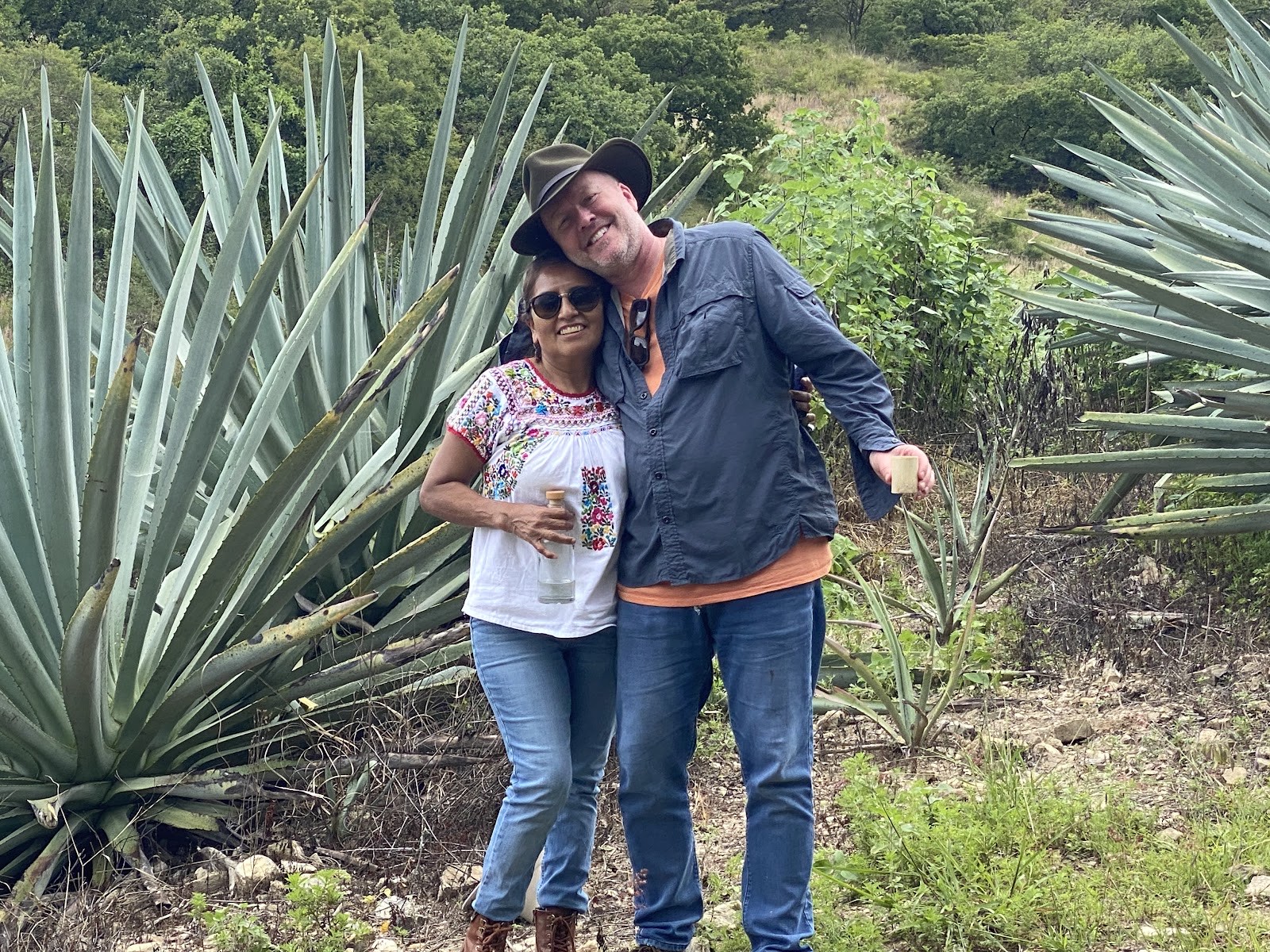 couple among the agave plants