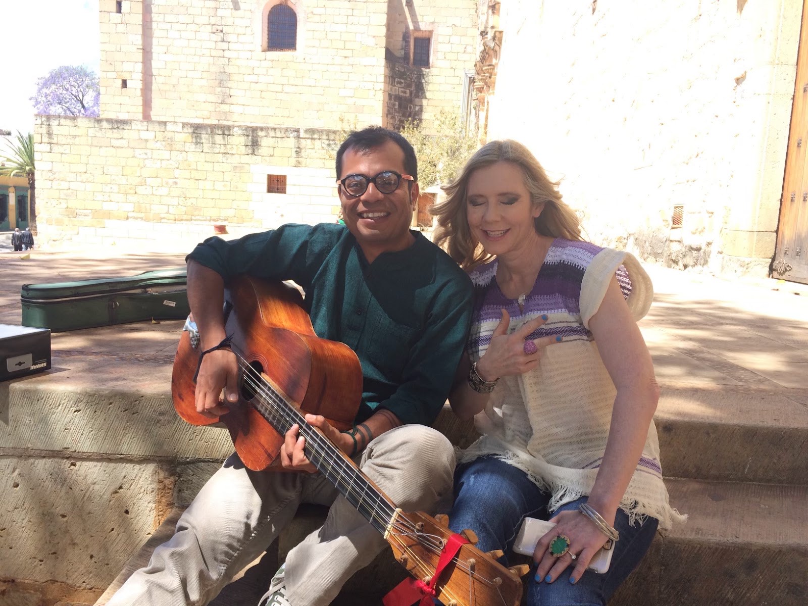 a couple with a guitar