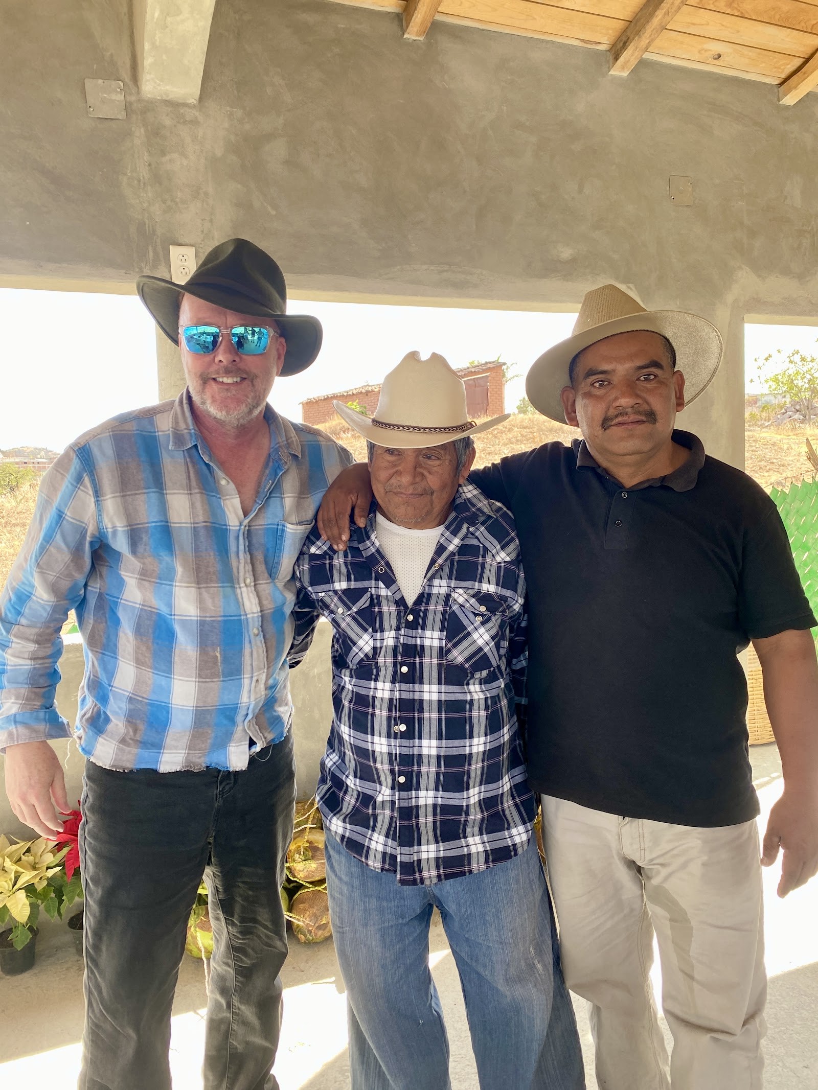 three men at the palenque